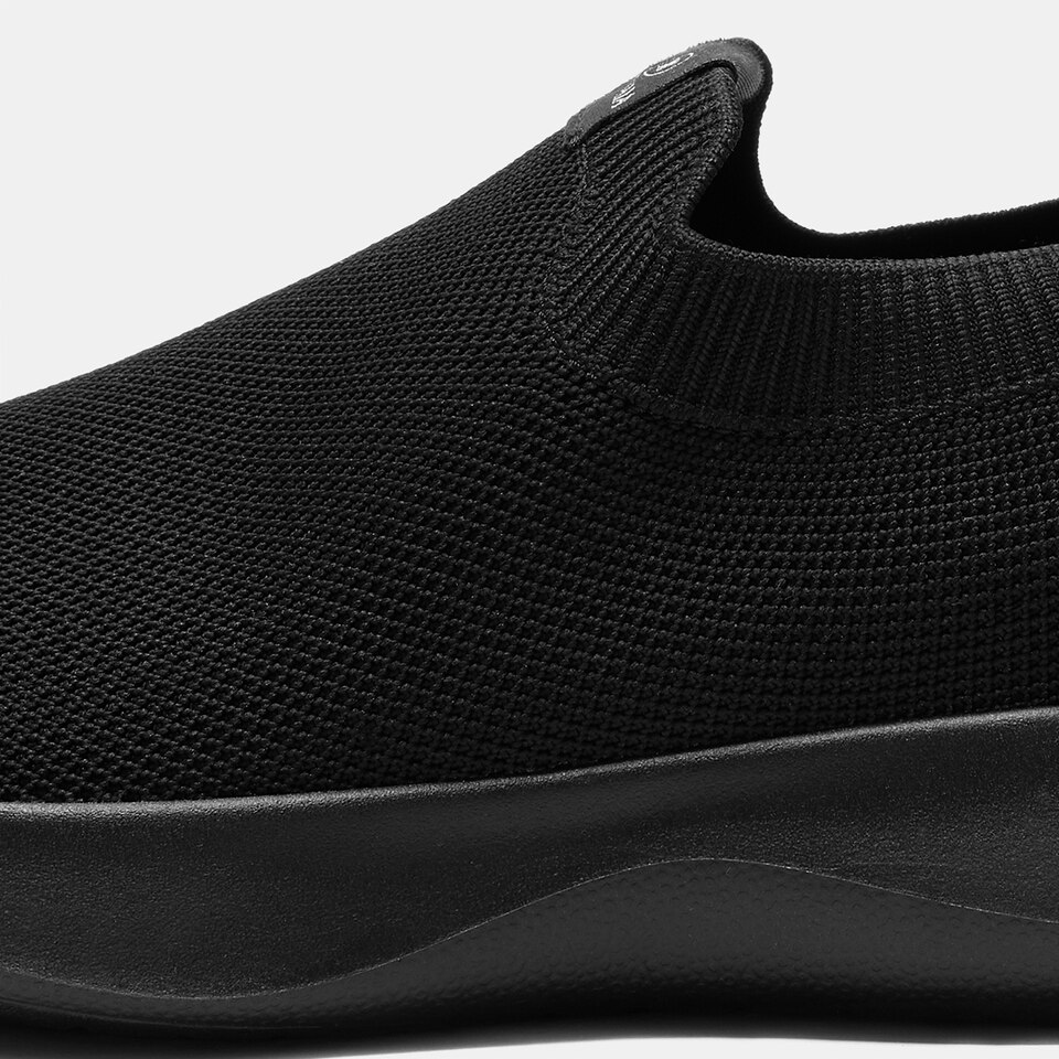 Bernie Waterproof Slip on Sneakers in Solid Black | Men's Shoes | VIVAIA