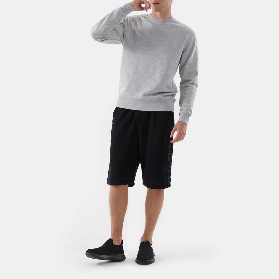 Bernie Waterproof Slip on Sneakers in Solid Black | Men's Shoes | VIVAIA