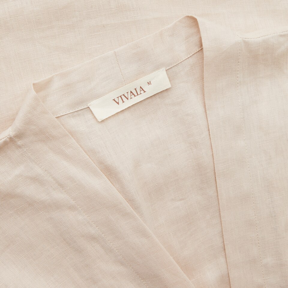 Laila Linen Wrap Dress in Cream Ivory | Women's Sustainable and Stylish Clothing | VIVAIA