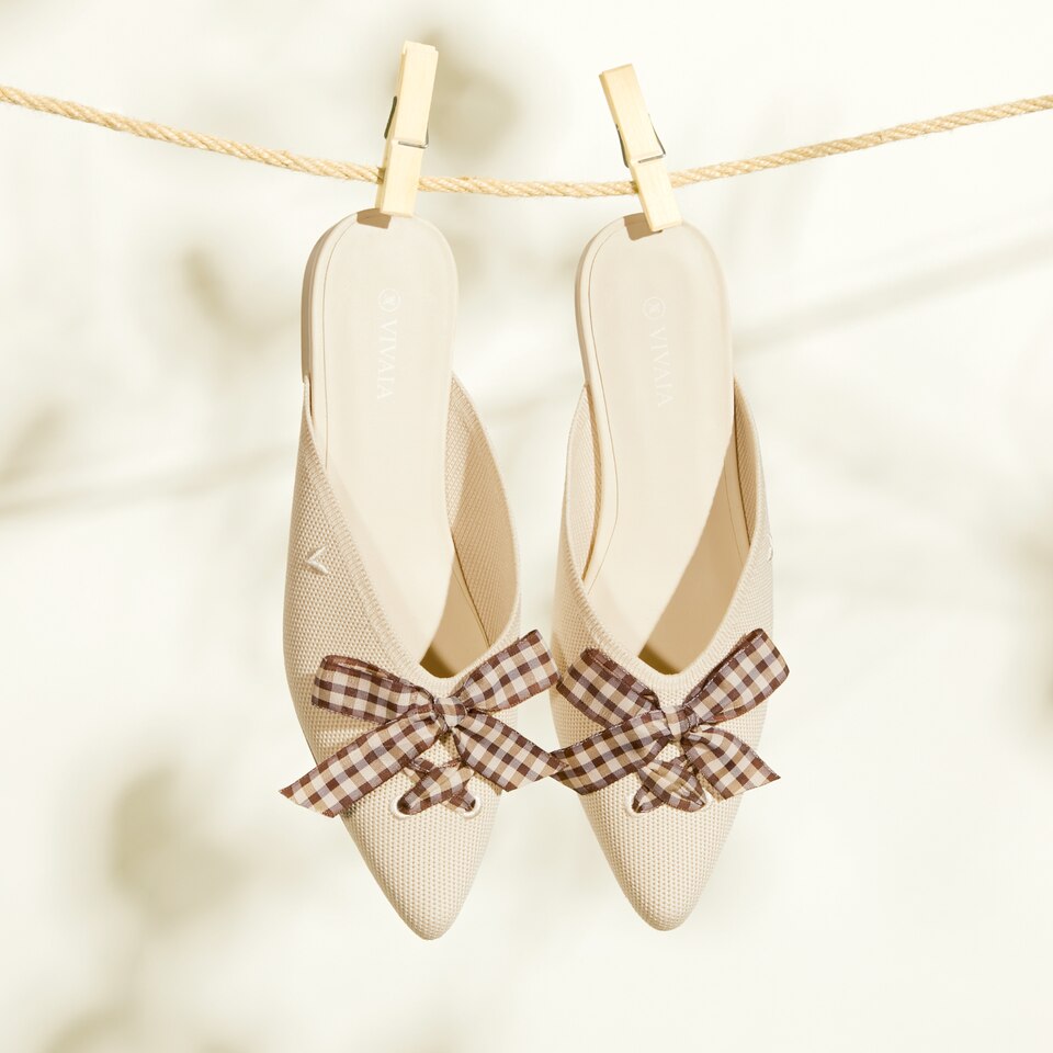 Molly Pointed-Toe Bow Mules in Cream Ivory - Women's Sustainable and Stylish Shoes | Vivaia