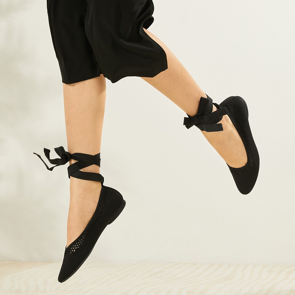 Tamia Beatrice Adjustable Ankle Wrap Round Toe Flats in Deep Ebony | Vivaia